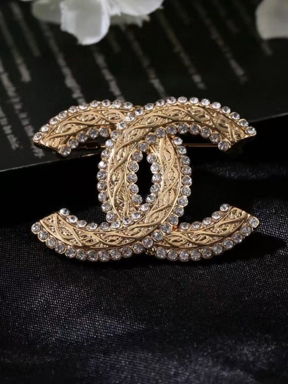 chaneI  brooches